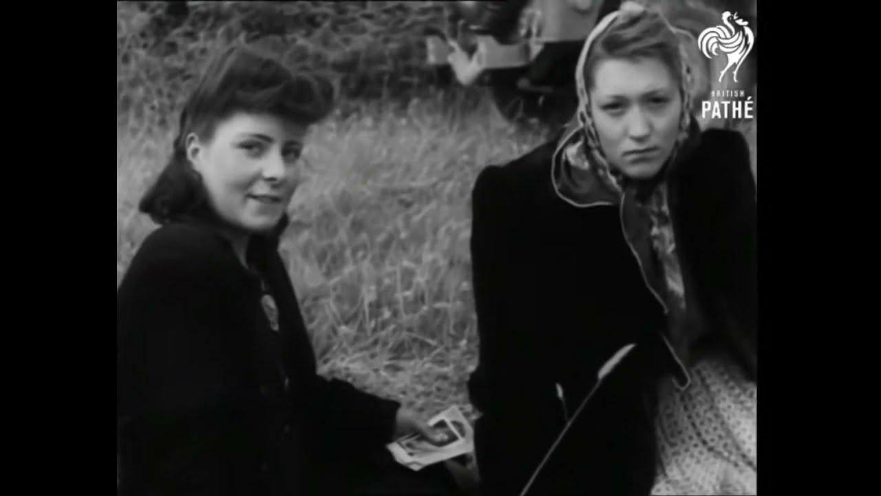 'Video thumbnail for Female soldiers surrendering at Cherbourg 1944.'